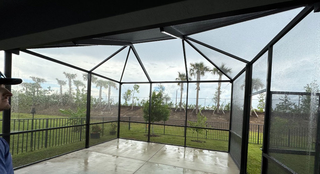 Porch screen enclosure installed in Melbourne FL featuring durable mesh panels and aluminum framing by Miller & Miller Services LLC.